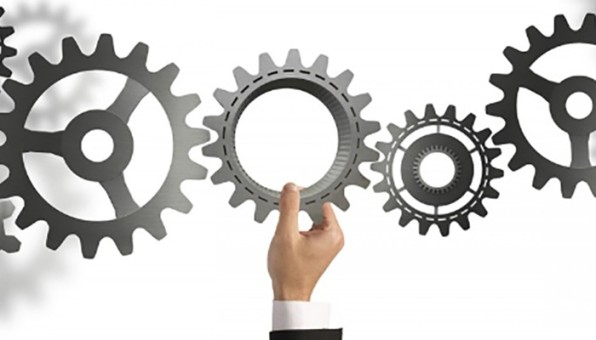 A generic image of cogs in a machine used to indicate a new level of thinking for start-up contractors.