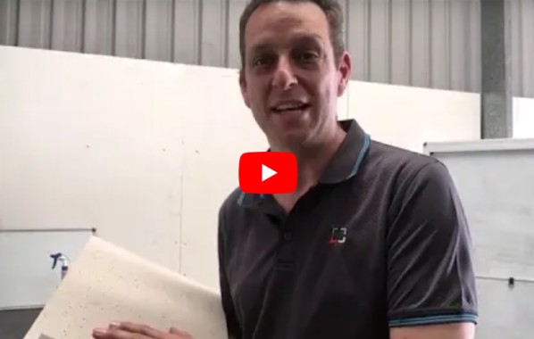 Resin Jack filming a video about a simple test used to qualify the adhesion of epoxy floor coatings to tiles.