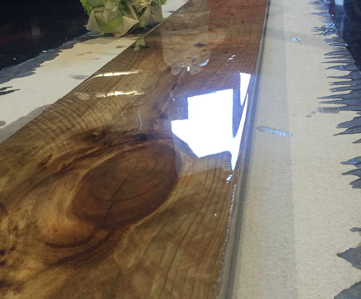 An copper metallic finish with extra depth and patterning was created using Artepoxy Liquid Crystal in this residential bedroom.