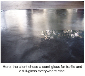 A decorative floor in a cafe with a semi-gloss finish in the high traffic areas and a high-gloss finish everywhere else.