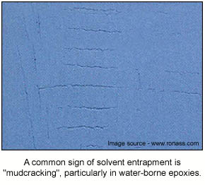 An example of a film defect called mudcracking, which can occur when solvent becomes trapped in the film.
