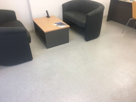 An example of the stone-look flake flooring in an office setting.