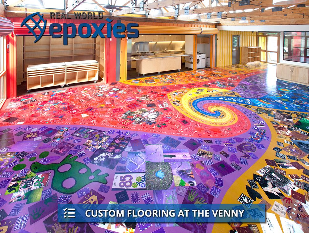 A custom decorative epoxy floor at an The Venny, which encapsulated original pieces of art from the children at the community centre.