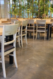 The wooden seats and golden bamboo stalks were complemented perfectly by the golden highlights on the metallic epoxy floor.