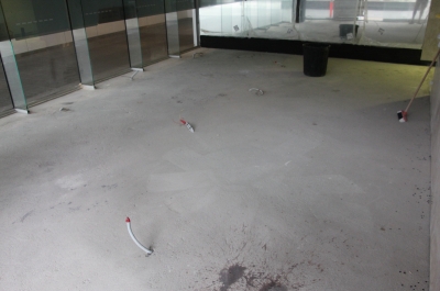 The empty restaurant and bare concrete floor before the metallic epoxy floor was installed.