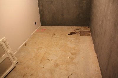 The wine cellar with stained concrete before the metallic epoxy floor was installed.