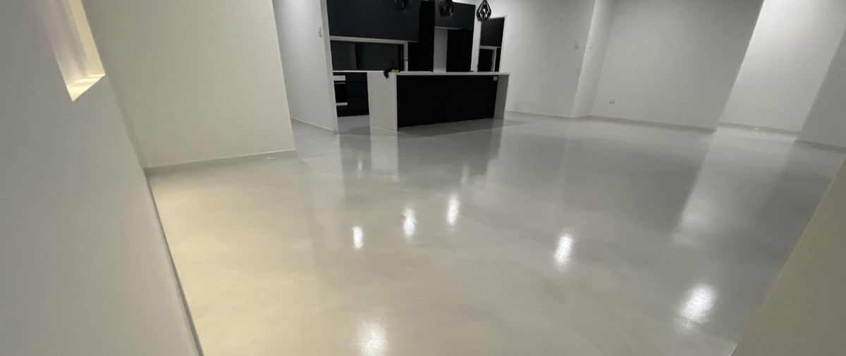 A new metallic floor with a matted PU topcoat in a modern residential kitchen.