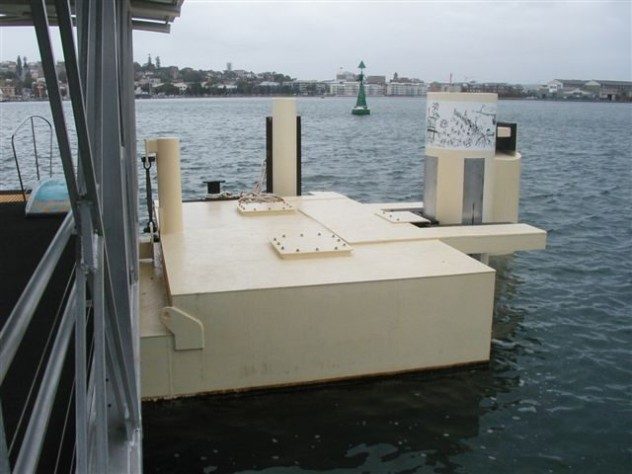 A marine jetty used for a harbour ferry coated with Jaxxon products in a custom beige colour.