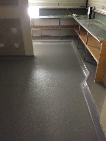 Ezypoxy Rollcoat used for non-slip flooring in a commercial food serving area.