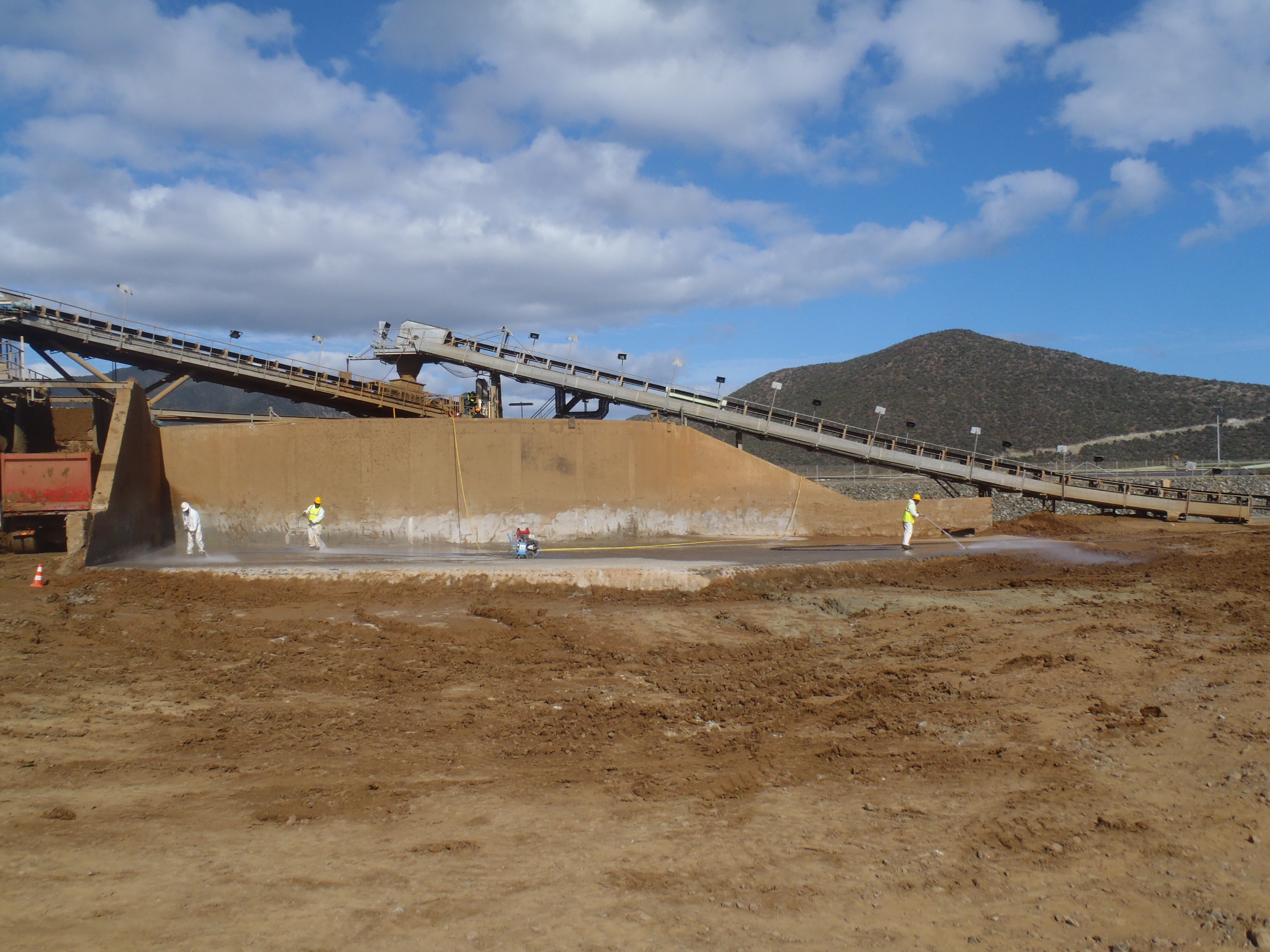 An overseas mine used Jaxxon industrial coatings to repair the loading zone where trucks receive the mined material.