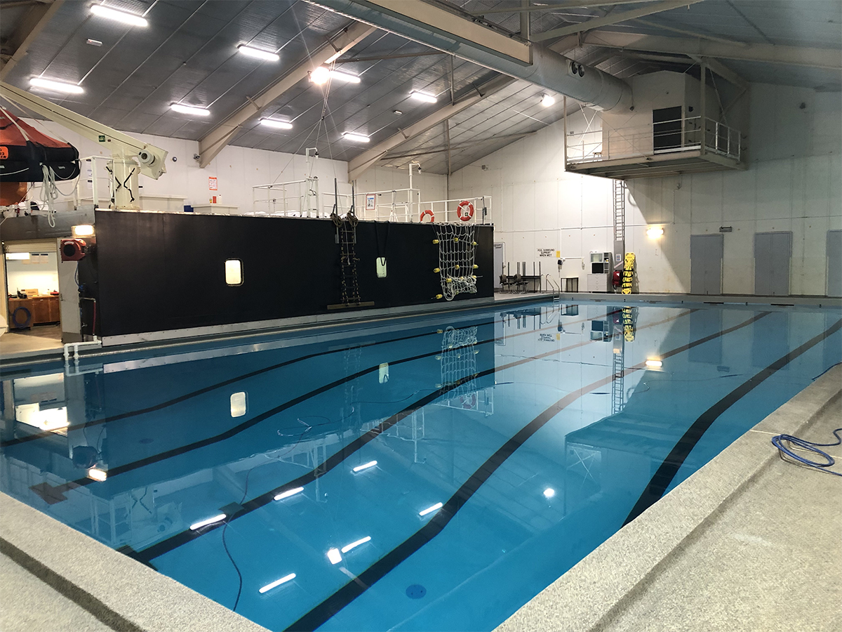 Jaxxon industrial coatings were used to line the surface of this swimming pool, including the black lane markings.