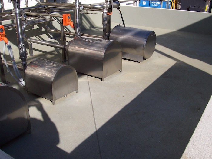Jaxxon 1545 used to protect a concrete bund from aggressive chemicals in a processing plant.