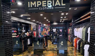 A clothing outlet used Artepoxy Lquid Crystal to create a custom black and gold theme for their floor.