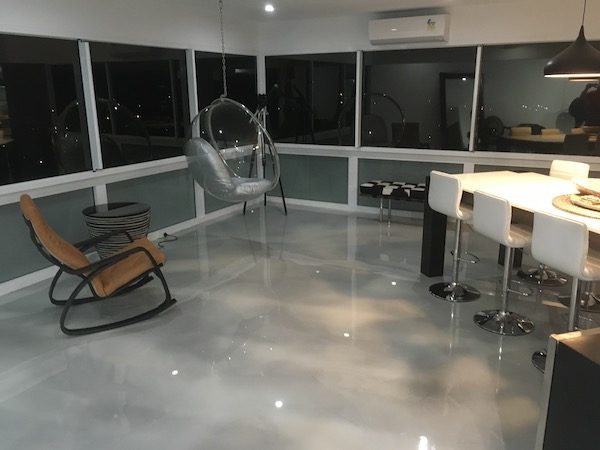 A modern penthouse apartment used Artepoxy Liquid Marble to create an iron grey marble finish to their floor.