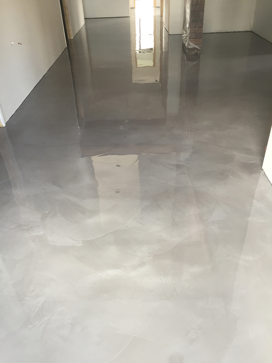 A close up of the marble pattern achieved in a residential entrance using Artepoxy Liquid Marble.