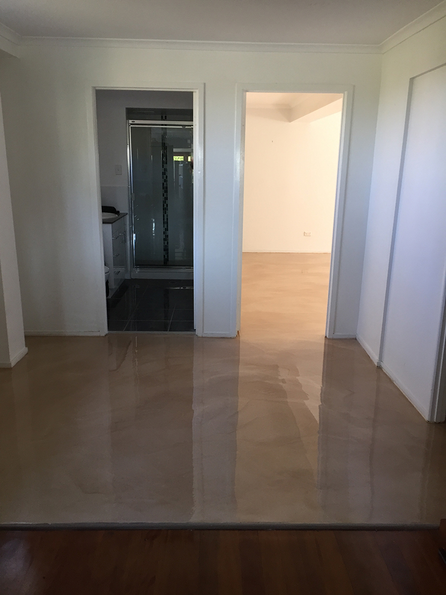 Artepoxy Liquid Marble used to create an attractive oatmeal floor in a residential hallway.