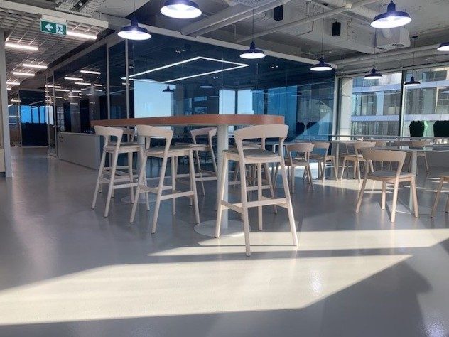 Ezypoly Clear was used as a clear topcoat in a modern office social area and eatery.