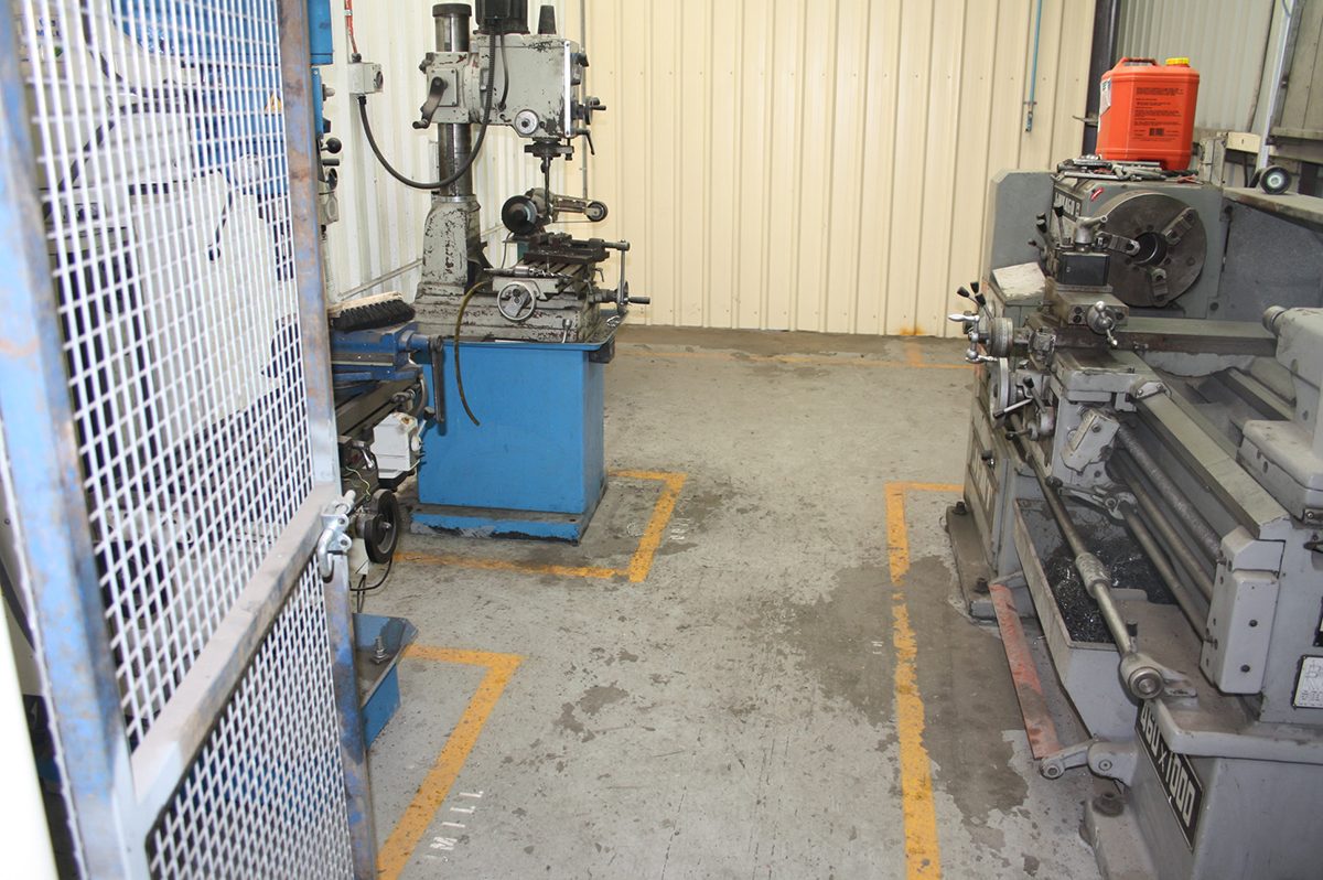 A photo taken before the project started showing the worn out floor coating that was previously in place.