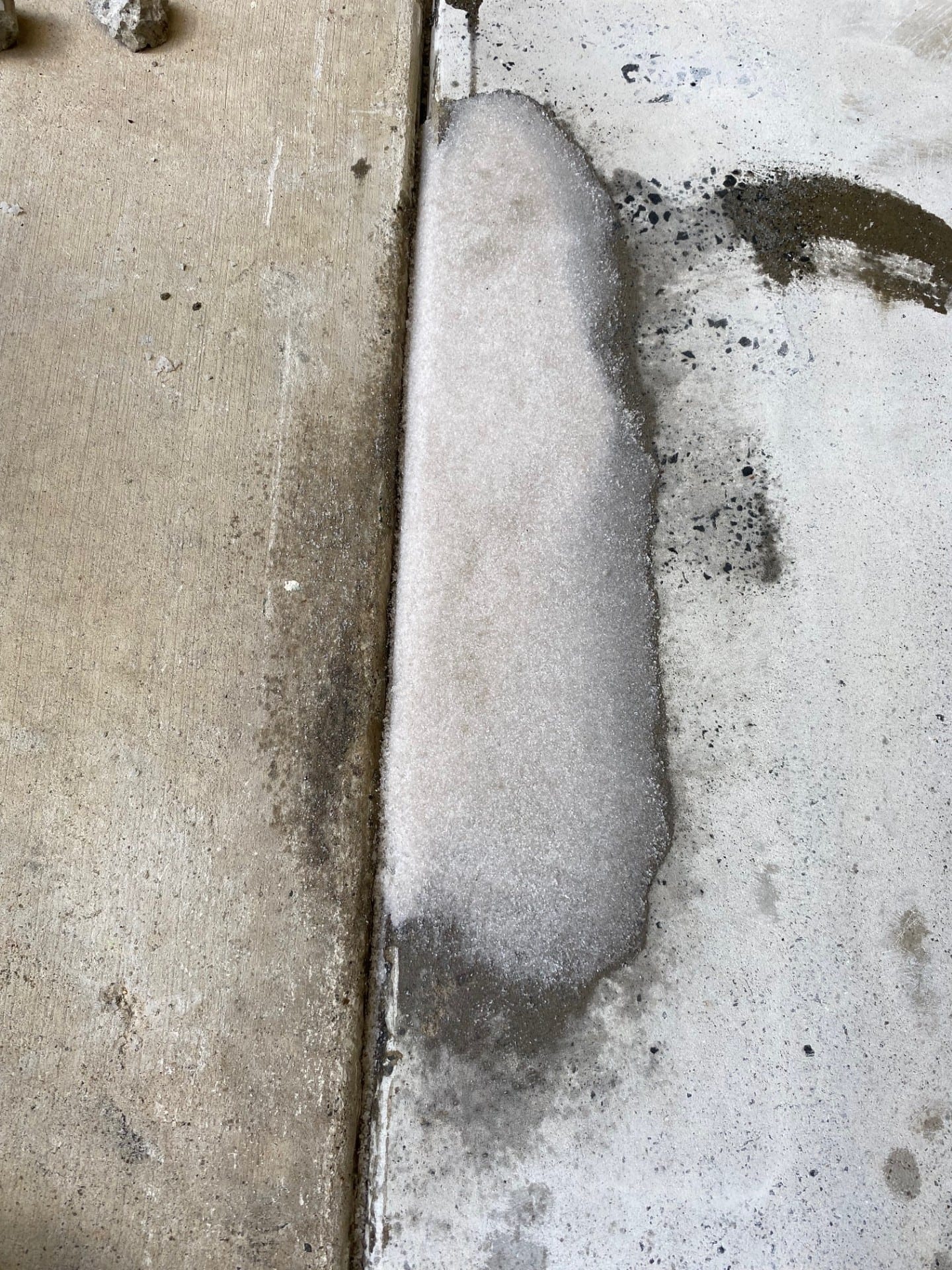 A low angle shot of the vibrant signal red non-slip epoxy floor showing the aggressive non-slip texture required in the abattoir.