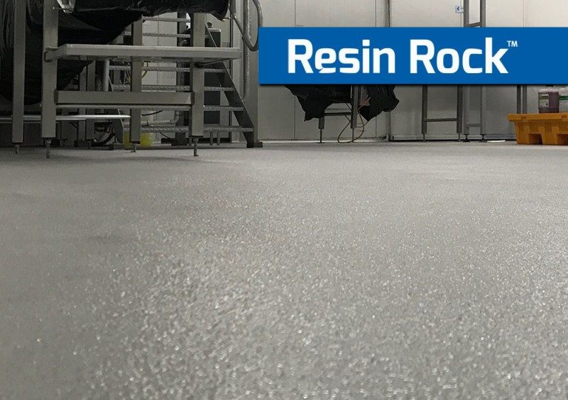 A low-angle photo of a Resin Rock floor in a commercial kitchen showing the textured finish of the high-build, non-slip epoxy system.
