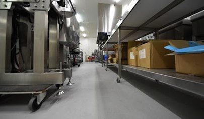 A low-angle shot of a Resin Rock system in the storage area of a commercial kitchen.