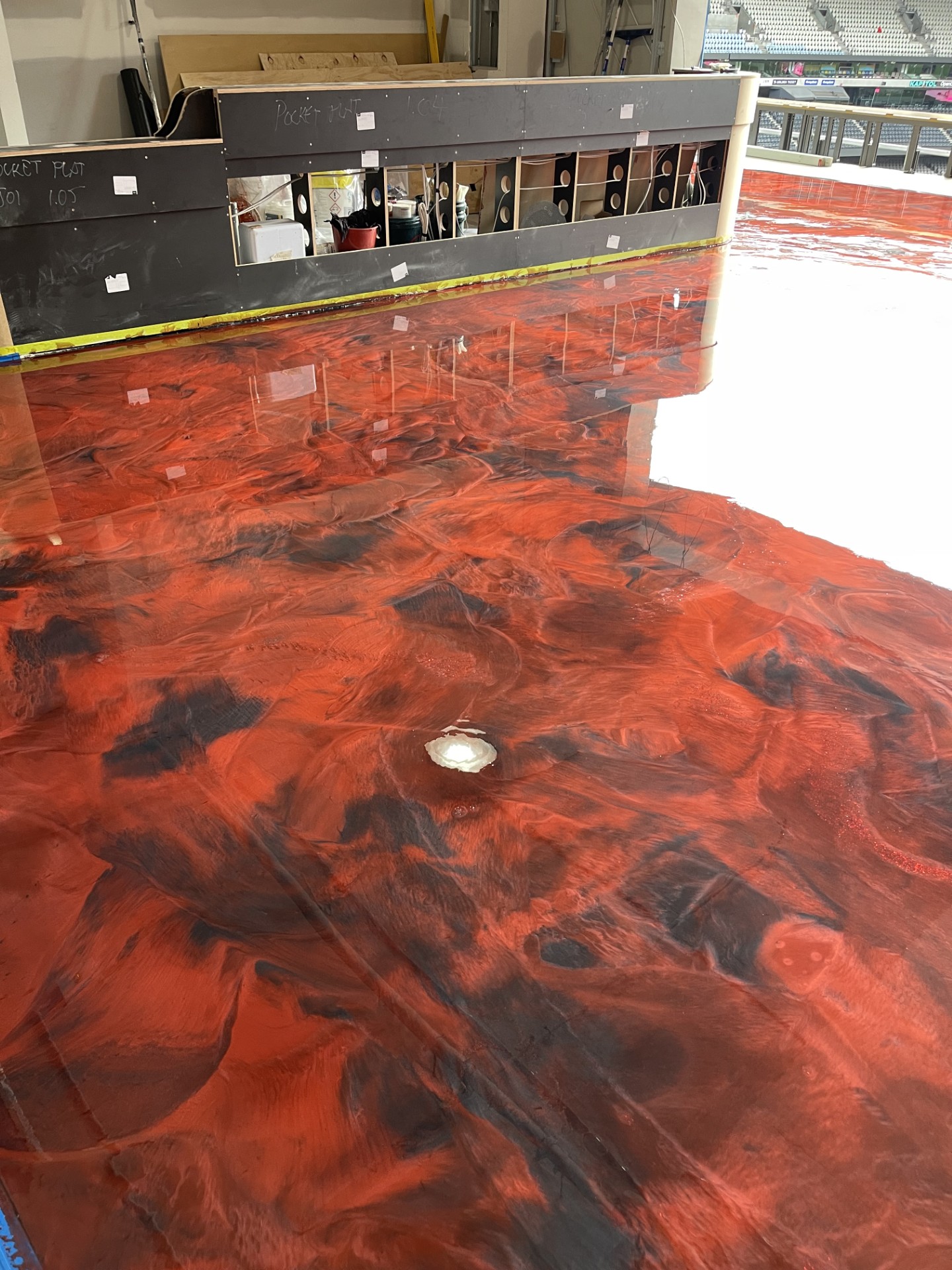 The cafe entrance, which had an old floor in place with an unusual orange colour and extensive wear and tear.