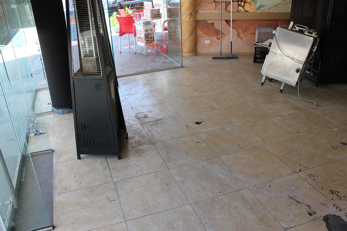 The original restaurant floor, which had an old tiles in place that didn't fit in with the new colour scheme and decor.