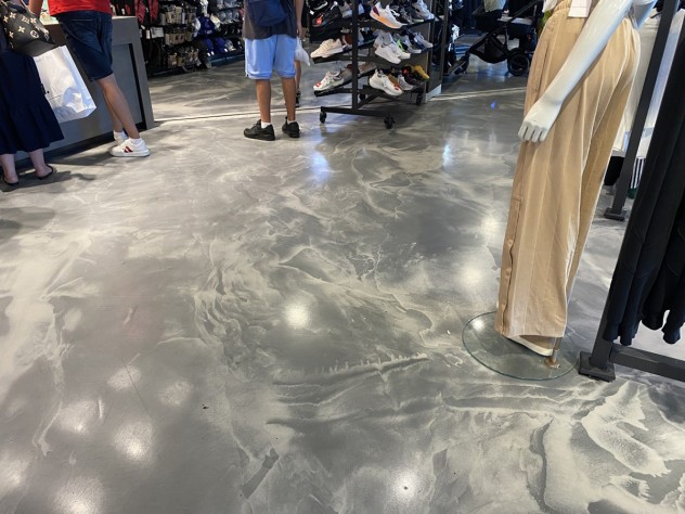 Customers shopping in the Gold Coast store Foot Locker store that had Resin Rustic applied in custom Tungsten colour.