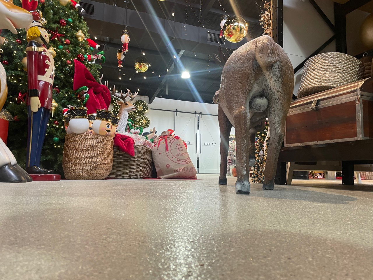 A retail epoxy flooring system from Real World Epoxies in the showroom area of a decoration supplier.