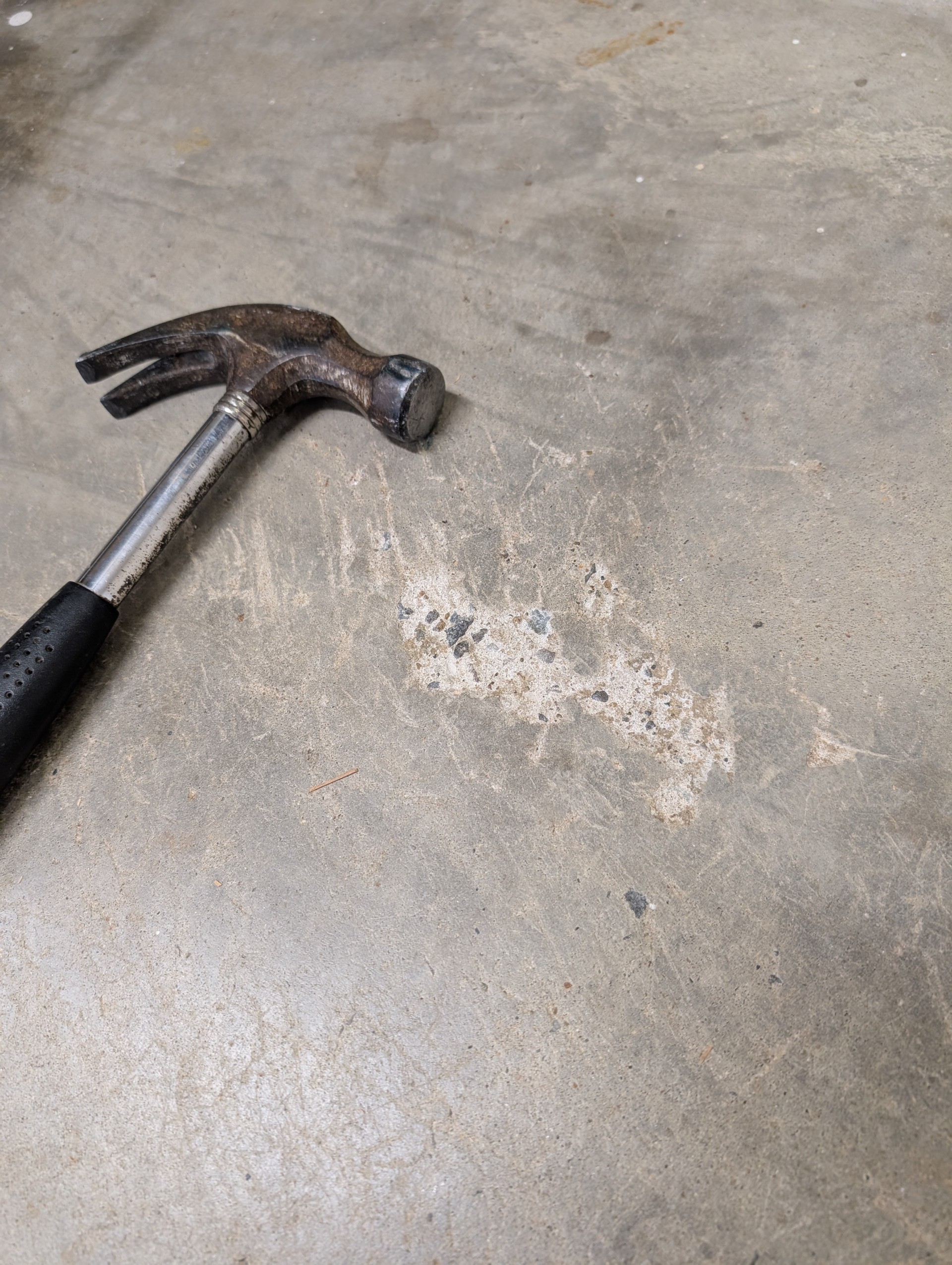 Let's Talk about - Garage floor showing rebar